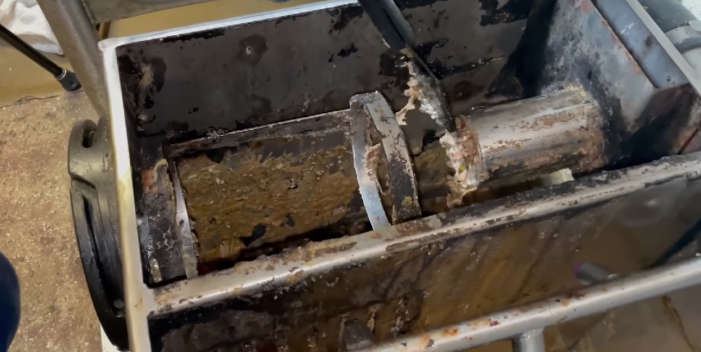cleaning a grease trap